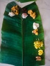 Top angle shot of onam sadhya in kerala style with curries in a banana leaf.