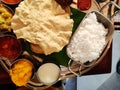 Top angle Tastey yummy south Indian lunch thali with variety of dishesh and sweet kesari curd rice parrota aplam papad lunch