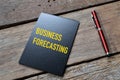 Blackboard written with text BUSINESS FORECASTING Royalty Free Stock Photo