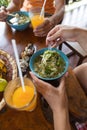 Top Angle View Of Woman Eating Noodles Chopstick And Drinking Orange Juice Sitting At Table Unrecognizable Girl Royalty Free Stock Photo