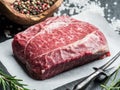 The top blade steak or beef steak on the graphite board with herbs and spices Royalty Free Stock Photo