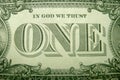 IN GOD WE TRUST and ONE ornately framed by decorative elements from the US dollar.