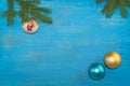 At the top of the branches were spruce with a Christmas tree toy. At the bottom there are two balls of gold and turquoise color. Royalty Free Stock Photo