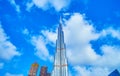 The top of Burj Khalifa building in clouds, Dubai, UAE Royalty Free Stock Photo