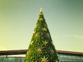 The top of the Christmas tree with a filtered sky in the background in Moscow, Russia Royalty Free Stock Photo