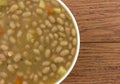 Bean soup in a bowl on a wood table Royalty Free Stock Photo