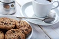 Top Closeup photo of sweet breakfast or snacks. Chocolate and vanilla cookies and cup of black coffee Royalty Free Stock Photo