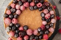 Two-layer cheesecake decorated with berries