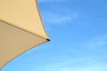 Top of a Colorful Beach Umbrella against the Sky. Royalty Free Stock Photo