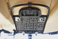 Top control panel with carbon fiber trim in a cockpit of Bombardier Global 6000 business jet at Singapore Airshow Royalty Free Stock Photo