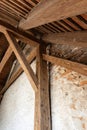 Top corner of aged wooden roof truss Royalty Free Stock Photo