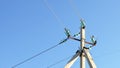 Top of corner transmission tower of high voltage overhead power line. strain glass insulators, consists of assembly of suspension Royalty Free Stock Photo