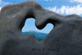 Top crater of hallasan mountain volcano seen through a stone sculpture in a park in Seogwipo, Jeju Island, Korea