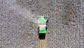 Aerial image of a Large Cotton picker harvesting a field.