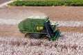 Aerial image of a Large Cotton picker harvesting a field.