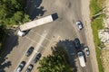 Top down aerial view of busy street intersection with moving cars traffic Royalty Free Stock Photo