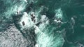 Top down aerial view of giant ocean waves crashing and foaming. Kamchatka, Pacific ocean. 4k video