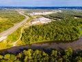 Top-down aerial view of green forest, river and freeway Royalty Free Stock Photo