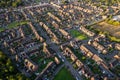 Top down aerial view of houses and streets in a residential area UK New Build Estate Agent House Prices 2022