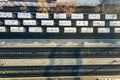 Top down aerial view of many cargo train cars on railway tracks Royalty Free Stock Photo