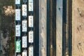 Top down aerial view of many cargo train cars on railway tracks Royalty Free Stock Photo