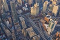 Top down aerial view of New York City  Brooklyn bridge infrastructure between the highrise modern office buildings Royalty Free Stock Photo