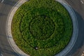 Top down aerial view of a small traffic roundabout