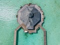 Top-down aerial view of the wooden over water hut at the tropical island Royalty Free Stock Photo