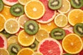 top down background view made of Fresh Sliced organic kiwi, oranges and lemons close-up Royalty Free Stock Photo