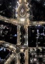 Top down city grid at night. Monument of freedom in Latvia