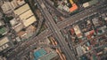 Top down of cross road traffic with cars, trucks, vehicles in aerial view. Downtown of Manila city