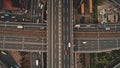 Top down cross traffic highway with cars, trucks aerial. Urban transportation at bridge road at city