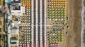 Top down drone aerial view of the umbrellas and gazebos on Italian sandy beaches. Riccione, Italy. Adriatic coast Royalty Free Stock Photo