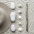 Serene Beach Zen: Hat, Stones, Shells, and Driftwood on Sand Royalty Free Stock Photo
