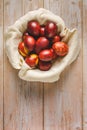 Top down flat lay view on easter eggs painted on wooden background with copy space