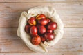 Top down flat lay view on easter eggs painted on wooden background with copy space