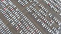 TOP DOWN: Flying above a massive car park full of new vehicles ready for export.