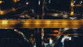 Top down night traffic highway bridge at Philippine metropolis city Manila. Aerial cars, truck drive