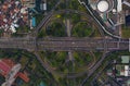 Top down overhead aerial view of large multi lane roundabout in Jakarta, Indonesia Large traffic junction on a highway