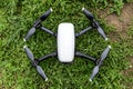 Top-down overhead view of a white drone with four propellers Royalty Free Stock Photo