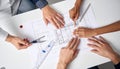 Architects Collaborating on a Building Blueprint Royalty Free Stock Photo