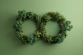 Top-down perspective of infinity symbol-shaped trees against lush green studio backdrop. Creative ecological concept AI Image Royalty Free Stock Photo