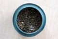 A top down portrait of fresh dried loose marrakech mint tea in a blue can. Ready to be used to make a delicious fresh cup of the Royalty Free Stock Photo