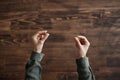 Hands Of Unrecognizable Woman Above Wooden Table Royalty Free Stock Photo