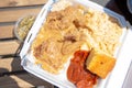 top down smothered chicken, soul food, styrofoam container