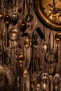 A top down view of an abstract arrangement of antique cutlery and utensils with a bronze tint. Royalty Free Stock Photo