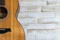 Top down view of beautiful acoustic guitar on a rustic white wood background Royalty Free Stock Photo