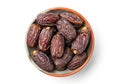 Bowl of medjool dates isolated on white background Royalty Free Stock Photo