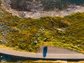 Top down view. Camper car on road, Hardangervidda plateau, Norway