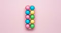 Colorful Easter Eggs in Carton on Pink Background Royalty Free Stock Photo
